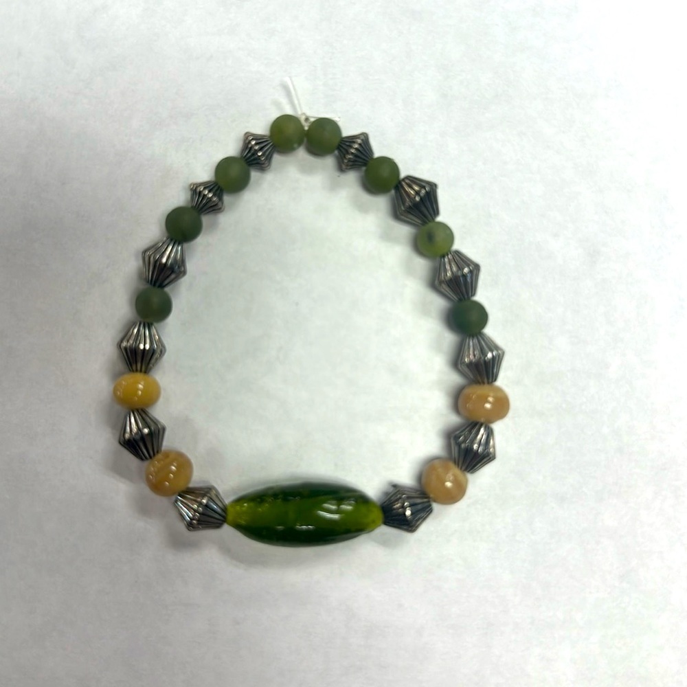 This beautiful handmade earthy toned bracelet! Perfect with any outfit